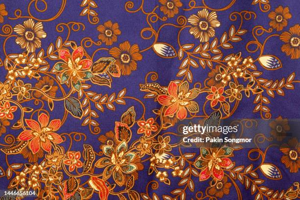 full frame thai silk traditional motif textile and texture background. - batik design stock pictures, royalty-free photos & images