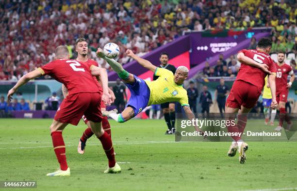 Richarlison of Brazil scores his side's second goal with an overhead kick during the FIFA World Cup Qatar 2022 Group G match between Brazil and...