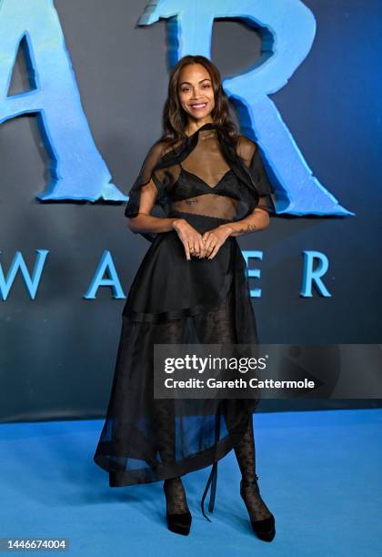 Zoe Saldana attends the photocall for "Avatar: The Way of Water" at The Corinthia Hotel on December 04, 2022 in London, England.