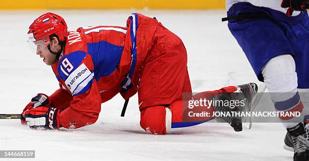 Russia's Denis Kokarev falls on the ice during the quarter-final match between Russia and Norway at the Ice Hockey World Championships in Stockholm...