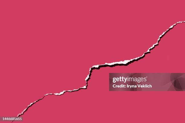 modern deconstruction concept with torn paper effect on paper in viva magenta color of the year 2023. - torn stock pictures, royalty-free photos & images