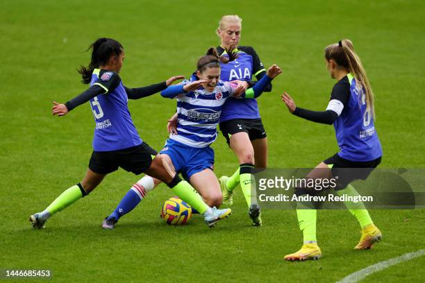 Emma Harries of Reading is challenged by Asmita Ale and Eveliina Summannen of Tottenham Hotspur during the FA Women's Super League match between...
