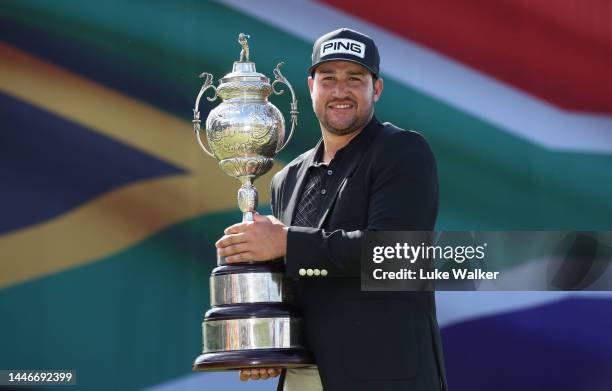 Thriston Lawrence of South Africa holds the winners trophy during Day Four of the Investec South African Open Championship at Blair Atholl Golf &...