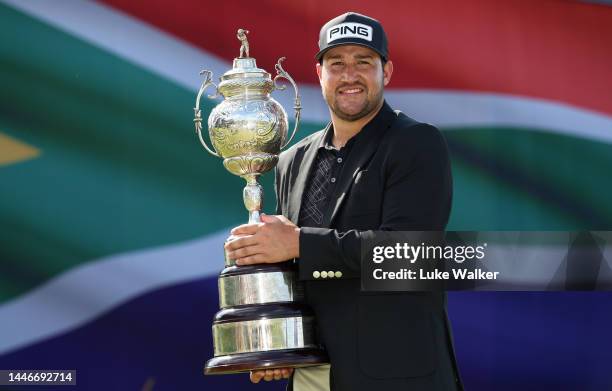 Thriston Lawrence of South Africa holds the winners trophy during Day Four of the Investec South African Open Championship at Blair Atholl Golf &...