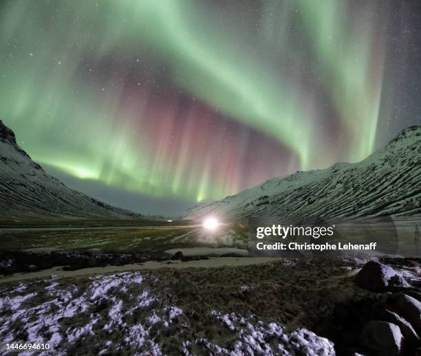 northern lights from akureyri mountains, iceland - akureyri stockfoto's en -beelden