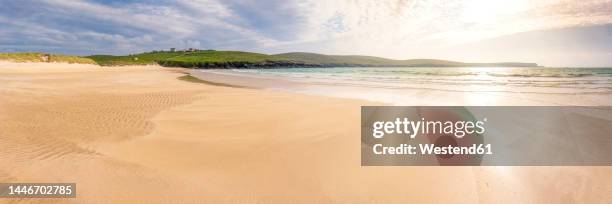 uk, scotland, yell, panoramic view of sands of breckon beach at sunset - sand stock pictures, royalty-free photos & images