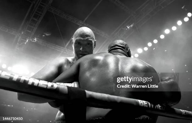 Tyson Fury and Derek Chisora fight during the WBC World Heavyweight Title fight between Tyson Fury and Derek Chisora at Tottenham Hotspur Stadium on...