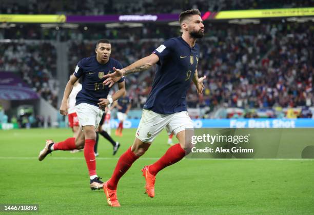 Olivier Giroud of France celebrates after scoring the team's first goal during the FIFA World Cup Qatar 2022 Round of 16 match between France and...