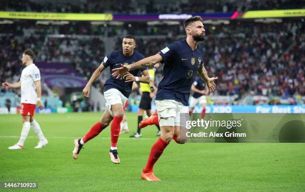 Olivier Giroud of France celebrates after scoring the team's first goal during the FIFA World Cup Qatar 2022 Round of 16 match between France and...