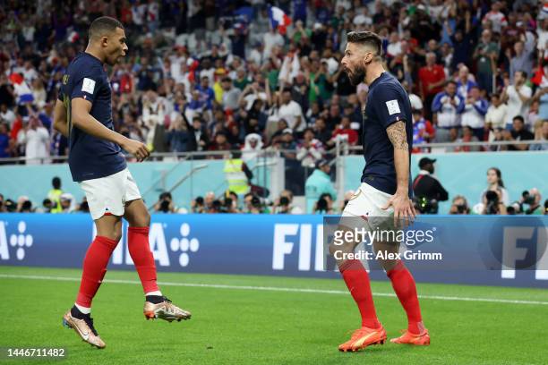 Olivier Giroud of France celebrates after scoring the team's first goal during the FIFA World Cup Qatar 2022 Round of 16 match between France and...
