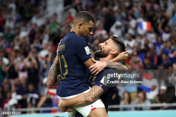 Olivier Giroud of France celebrates after scoring the team's first goal during the FIFA World Cup Qatar 2022 Round of 16 match between France and...