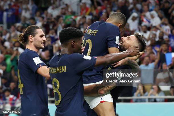 Olivier Giroud of France celebrates after scoring the team's first goal during the FIFA World Cup Qatar 2022 Round of 16 match between France and...