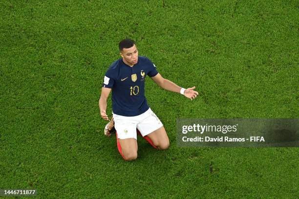 Olivier Giroud of France celebrates after scoring the team's first goal during the FIFA World Cup Qatar 2022 Round of 16 match between France and...