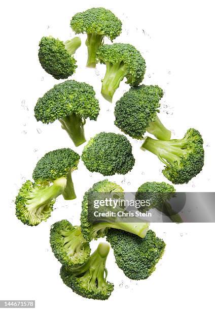 flying broccoli - broccoli stock pictures, royalty-free photos & images