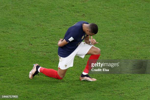 Kylian Mbappe of France celebrates after scoring the team's second goal during the FIFA World Cup Qatar 2022 Round of 16 match between France and...