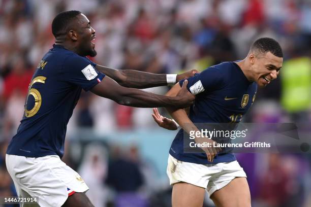 Kylian Mbappe of France celebrates after scoring the team's third goal during the FIFA World Cup Qatar 2022 Round of 16 match between France and...