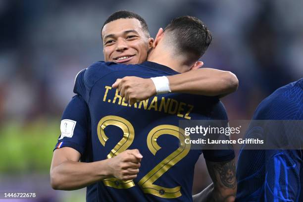 Kylian Mbappe and Theo Hernandez of France celebrate their 3-1 victory in the FIFA World Cup Qatar 2022 Round of 16 match between France and Poland...