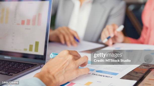 close up of young asian businesspeople startup company having brainstorm meeting about new project in cafe. - financials stock pictures, royalty-free photos & images