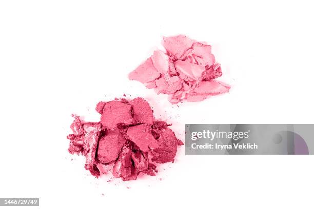 cosmetic make-up  product for a woman  - eyeshadow in powder in  pink and  red viva magenta  color of the year 2023 on white color background. - makeup pile stock pictures, royalty-free photos & images