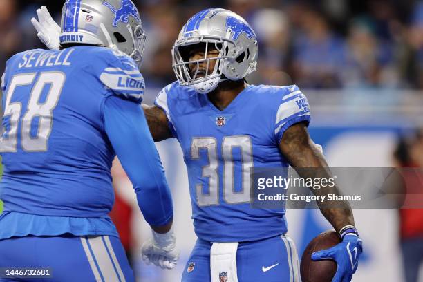 Jamaal Williams of the Detroit Lions celebrates after a touchdown during the first quarter of the game against the Jacksonville Jaguars at Ford Field...
