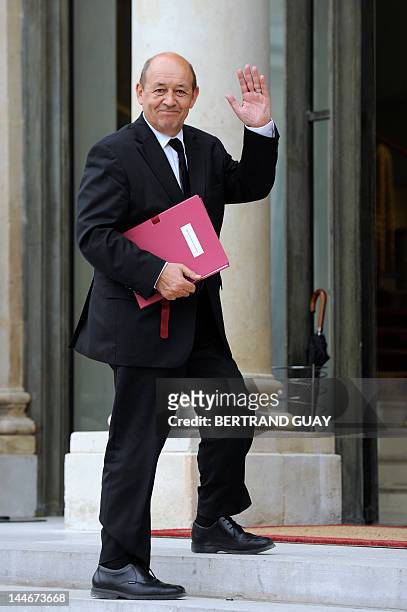 French Defence Minister, Jean-Yves Le Drian arrives at the presidential Elysee Palace before the first weekly cabinet meeting on May 17 2011, in...