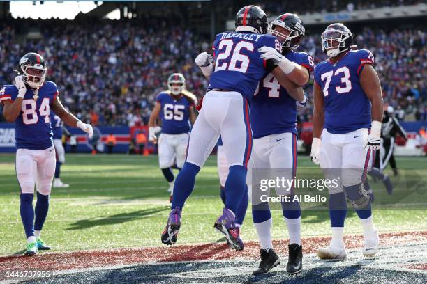 Saquon Barkley of the New York Giants celebrates with teammates after scoring a touchdown in the second quarter of a game against the Washington...