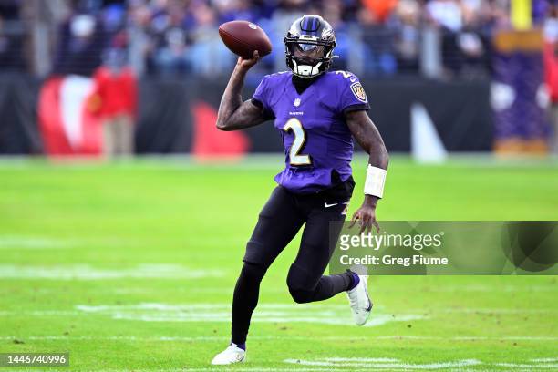 Tyler Huntley of the Baltimore Ravens scrambles with the ball against the Denver Broncos during the second quarter of the game at M&T Bank Stadium on...