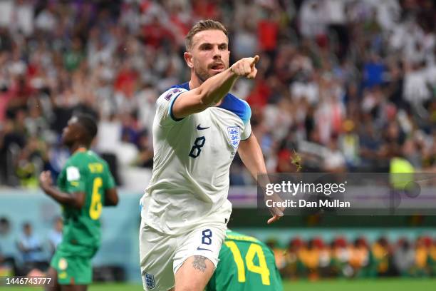 Jordan Henderson of England celebrates after scoring the team's first goal during the FIFA World Cup Qatar 2022 Round of 16 match between England and...