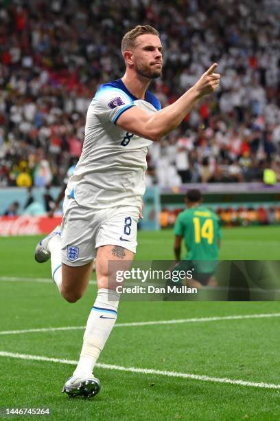 Jordan Henderson of England celebrates after scoring the team's first goal during the FIFA World Cup Qatar 2022 Round of 16 match between England and...