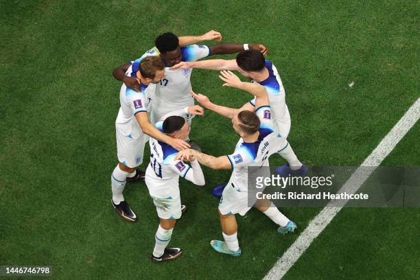 Harry Kane of England celebrates with teammates after scoring the team's second goal during the FIFA World Cup Qatar 2022 Round of 16 match between...
