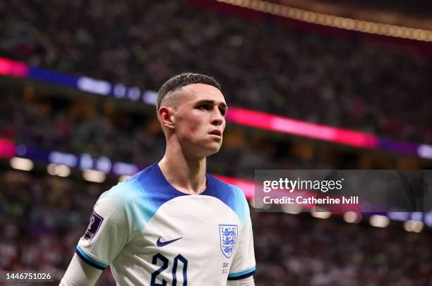 Phil Foden of England looks on after being substituted during the FIFA World Cup Qatar 2022 Round of 16 match between England and Senegal at Al Bayt...