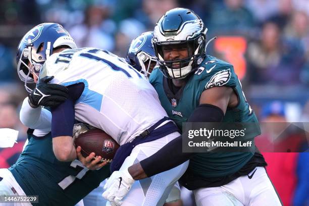 Josh Sweat of the Philadelphia Eagles sacks Ryan Tannehill of the Tennessee Titans in the third quarter at Lincoln Financial Field on December 04,...