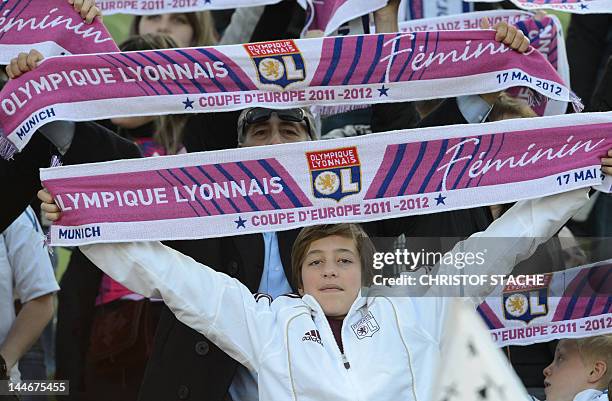 Supporters of Lyon hold scarves to cheer their team during the UEFA Women's Champions League final football match, Olympique Lyonnais vs 1 FFC...