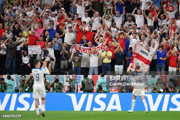 England fans celebrate after the team's victory during the FIFA World Cup Qatar 2022 Round of 16 match between England and Senegal at Al Bayt Stadium...