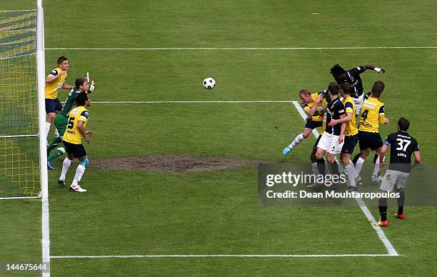 Wilfried Bony of Vitesse rises high to head the third goal of the game for his team during the Eredivisie Europa League Playoff match between RKC...