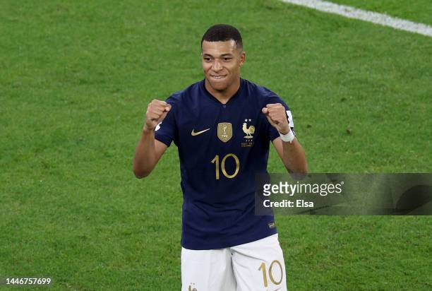 Kylian Mbappe of France celebrates after scoring the team's third goal in the second half against Poland during the FIFA World Cup Qatar 2022 Round...