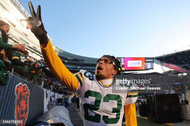 Jaire Alexander of the Green Bay Packers waves to fans in the crowd after defeating Chicago Bears at Soldier Field on December 04, 2022 in Chicago,...
