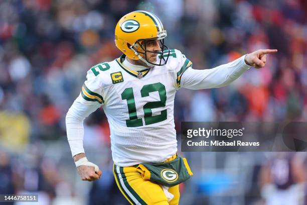 Aaron Rodgers of the Green Bay Packers celebrates after a successful two-point conversion against the Chicago Bears during the fourth quarter of the...