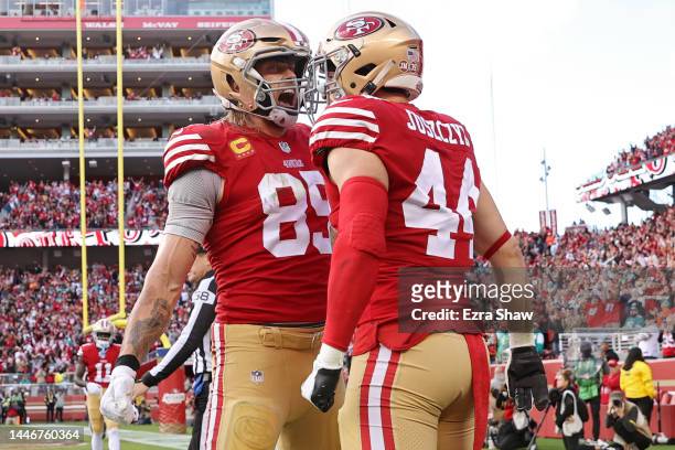 George Kittle of the San Francisco 49ers and Kyle Juszczyk of the San Francisco 49ers celebrates after Juszcyk's touchdown during the first quarter...