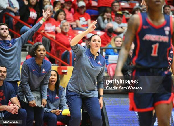 Head coach Adia Barnes of the Arizona Wildcats gestures as she watches a 3-point shot during the second half of her team's game against the New...