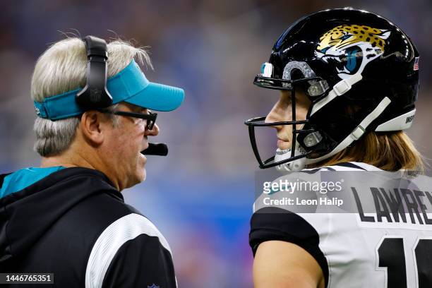 Head coach Doug Pederson of the Jacksonville Jaguars and Trevor Lawrence look on during the second half of the game against the Detroit Lions at Ford...