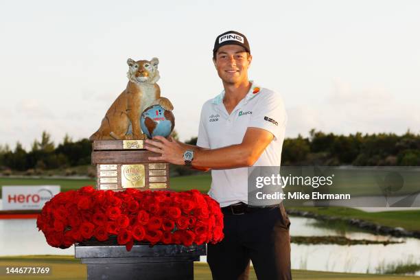 Viktor Hovland of Norway celebrates with the trophy after winning during the final round Hero World Challenge at Albany Golf Course on December 04,...