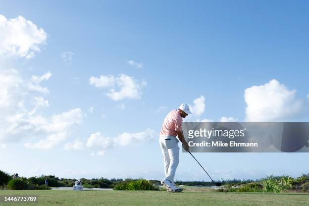Scottie Scheffler of the United States plays his shot from the 15th tee during the final round Hero World Challenge at Albany Golf Course on December...