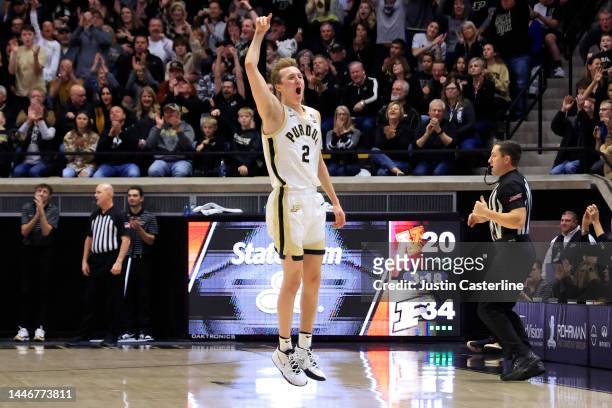 Fletcher Loyer of the Purdue Boilermakers celebrates a three pointer during the first half against the Minnesota Golden Gophers at Mackey Arena on...