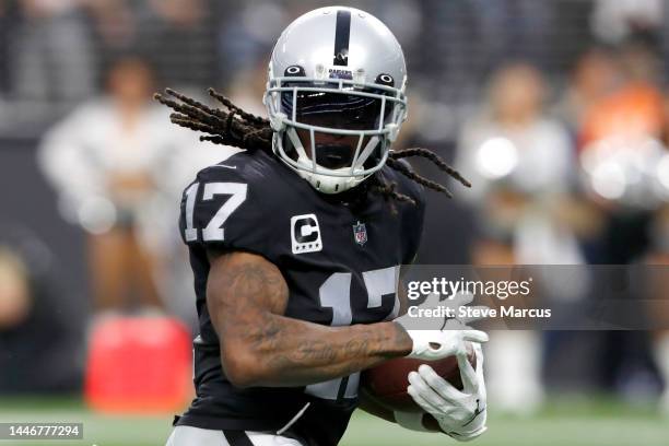 Davante Adams of the Las Vegas Raiders catches a pass for a touchdown in the third quarter of a game against the Los Angeles Chargers at Allegiant...