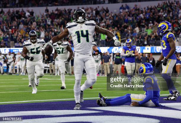 Metcalf of the Seattle Seahawks celebrates after a touchdown during the fourth quarter of the game against the Los Angeles Rams at SoFi Stadium on...
