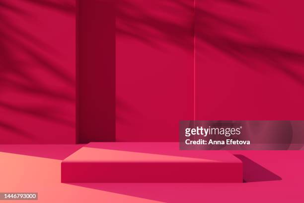 magenta square podium in red interior with leaf shadows on the wall. empty space to showcase your product. three dimensional illustration. demonstrating viva magenta - color of the year 2023 - red pedestal stock pictures, royalty-free photos & images