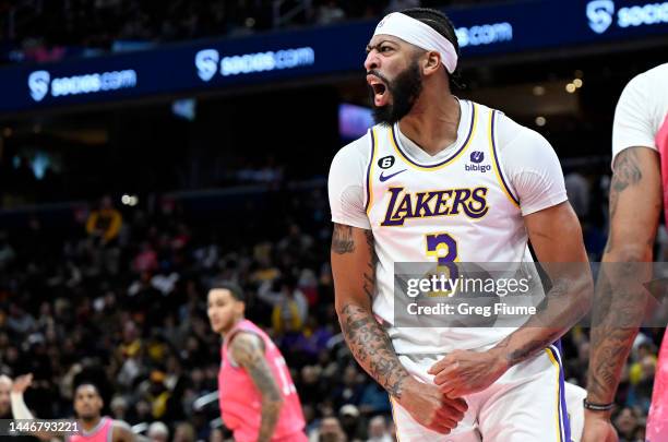 Anthony Davis of the Los Angeles Lakers celebrates during the third quarter of the game against the Washington Wizards at Capital One Arena on...