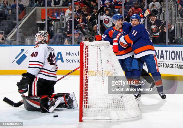 Zach Parise of the New York Islanders celebrates his goal at 14:31 of the second period against Arvid Soderblom of the Chicago Blackhawks and is...