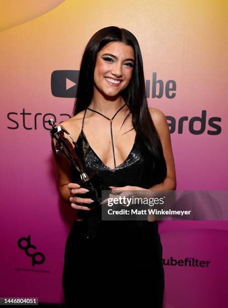 Charli D'Amelio poses with her award during the 2022 YouTube Streamy Awards at the Beverly Hilton on December 04, 2022 in Los Angeles, California.